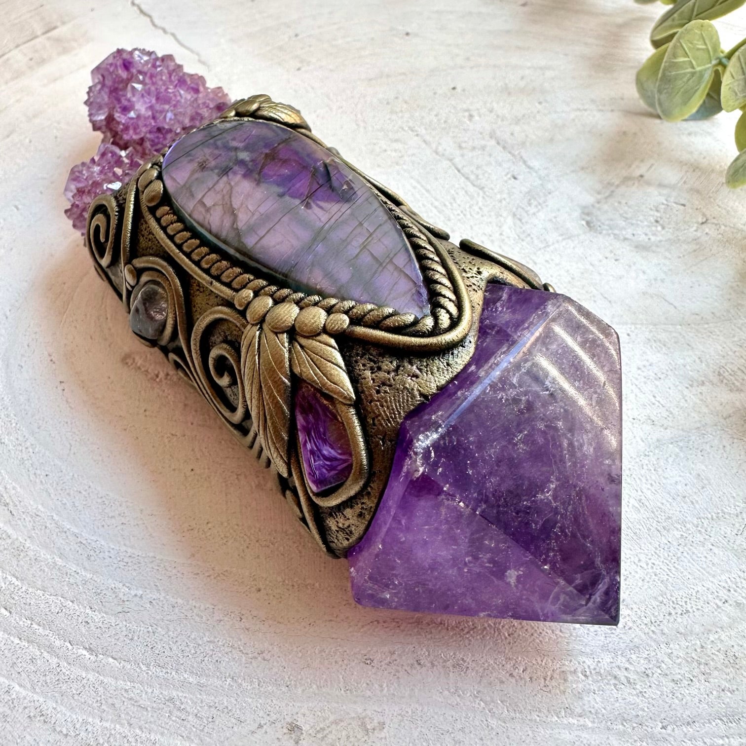 Unique handmade crystal wand featuring Spirit Quartz with rich purple natural gemstones.