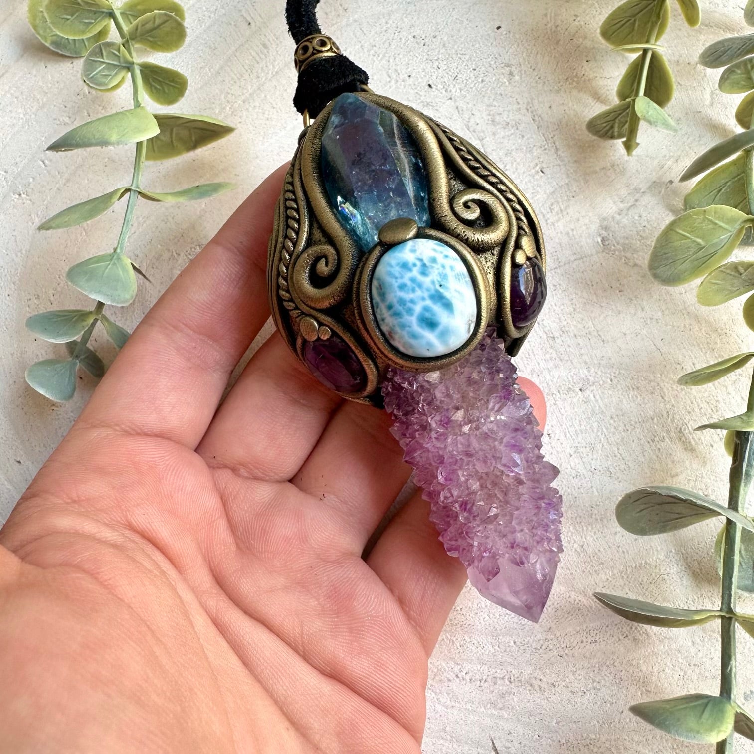 Handmade metaphysical healing tool combining Spirit Quartz, Aqua Aura Quartz, Amethyst and Larimar.