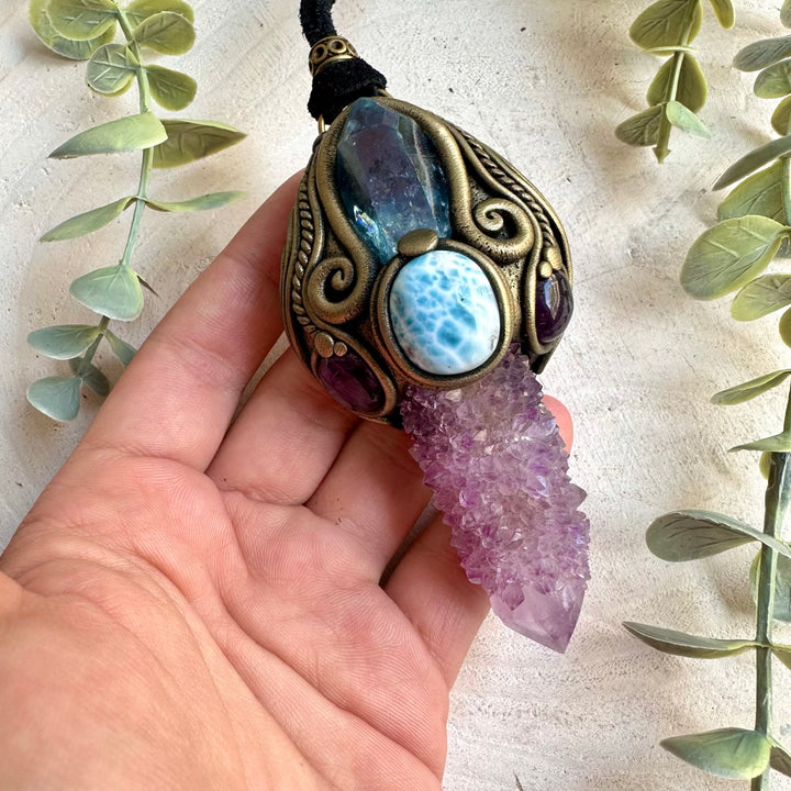 Handmade metaphysical healing tool combining Spirit Quartz, Aqua Aura Quartz, Amethyst and Larimar.