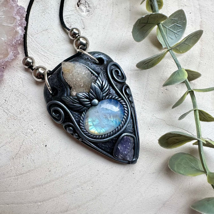 Spirit quartz paired with rainbow moonstone and tanzanite