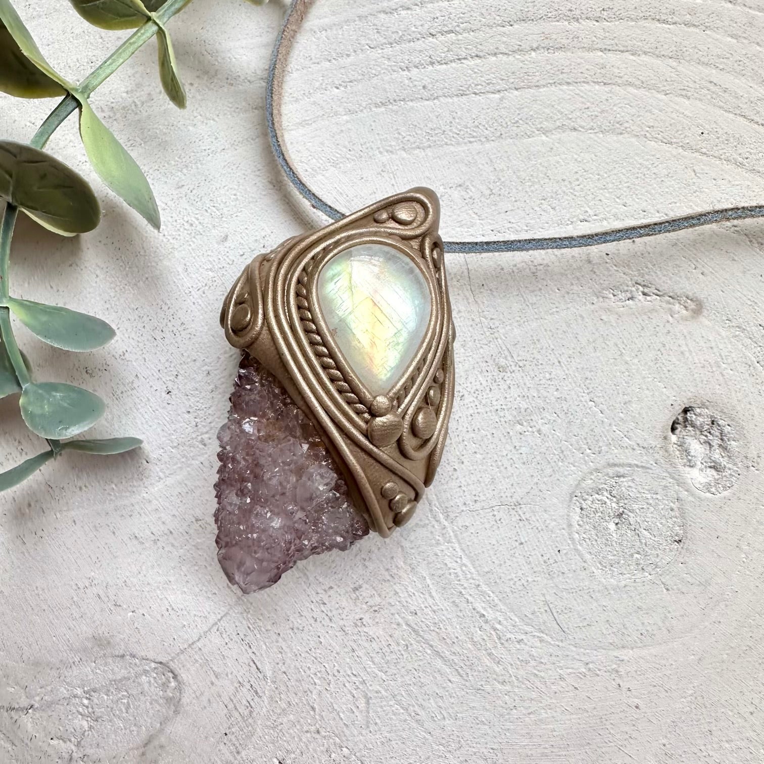 Rainbow moonstone paired with spirit quartz in a necklace