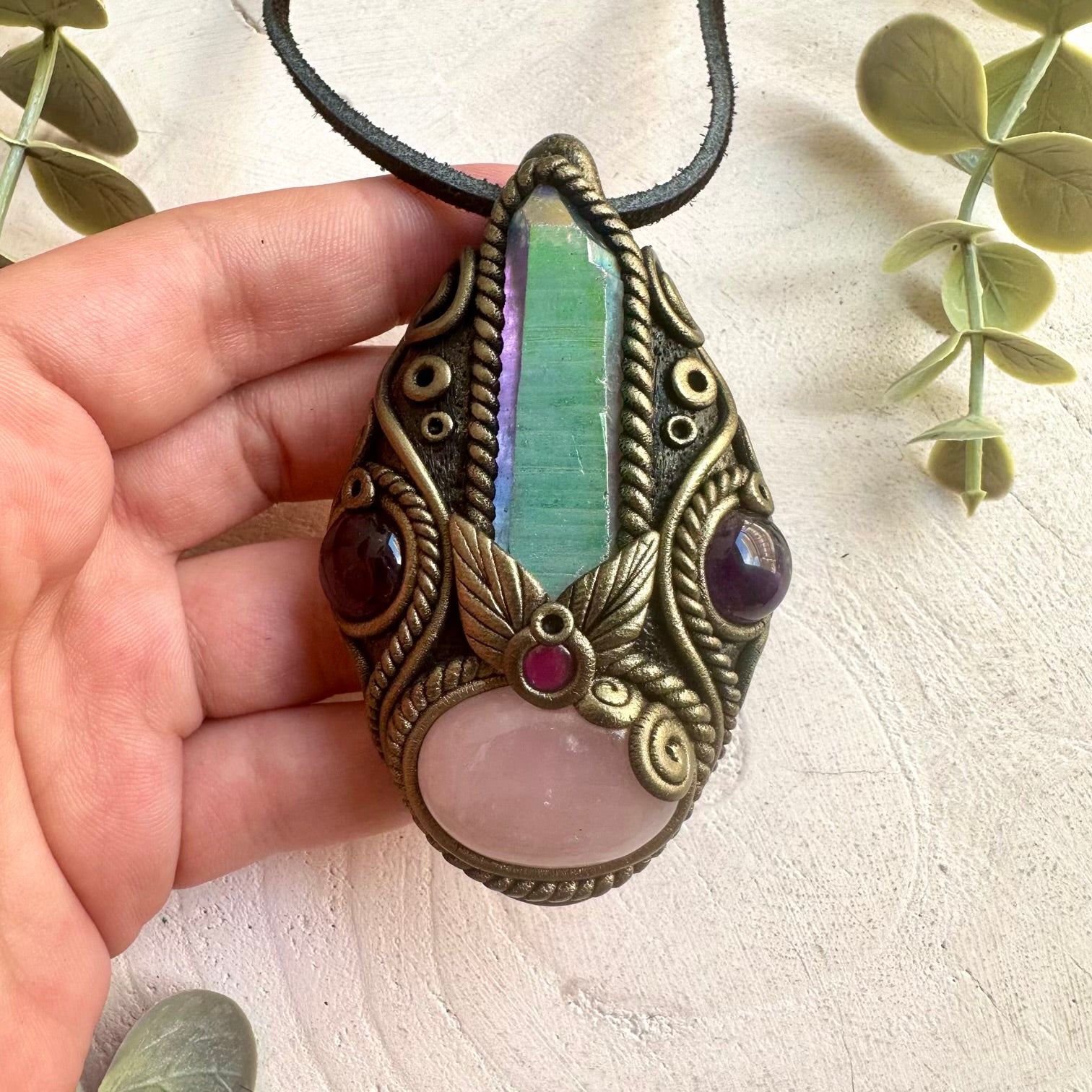 Handmade Rose Quartz pendant necklace featuring an Angel Aura Quartz Point, Amethyst and Rhodolite Garnet, a one of a kind crystal talisman designed for self-love and emotional healing.