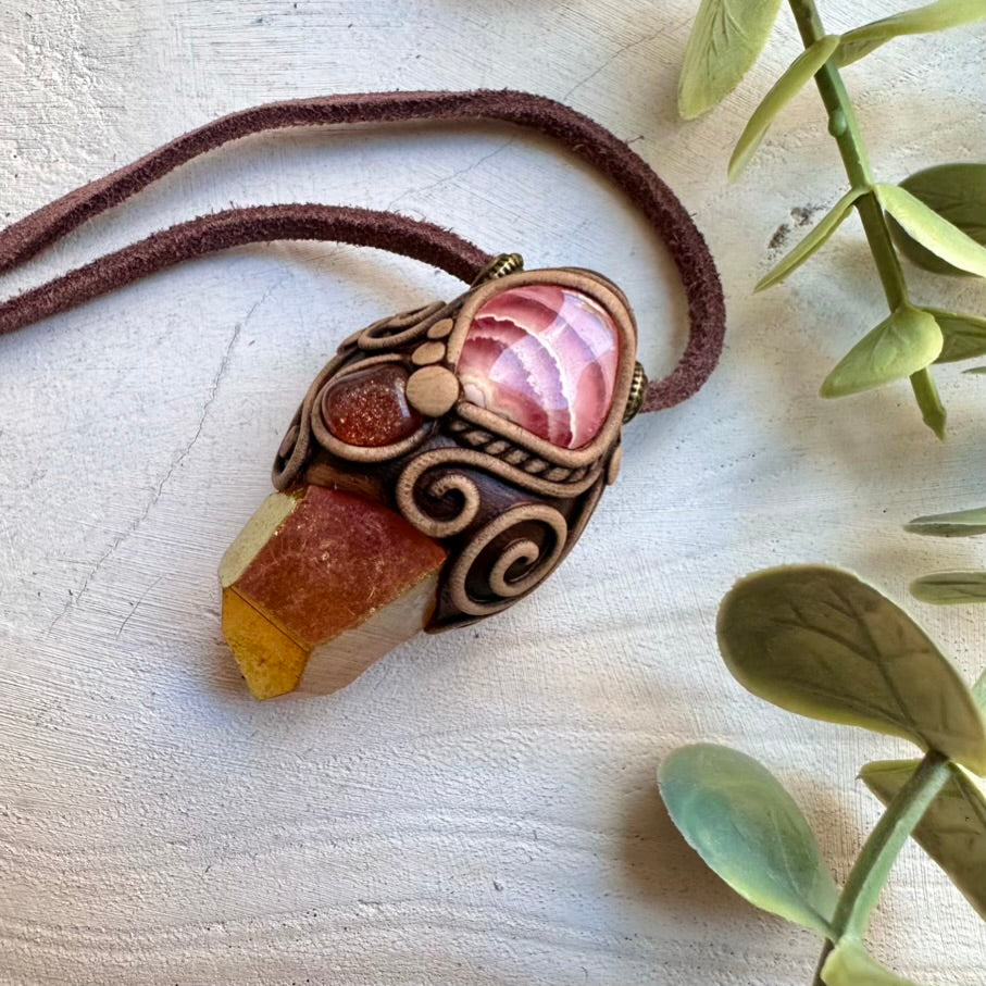 Natural sunset aura quartz paired with rhodochrosite and sunstone