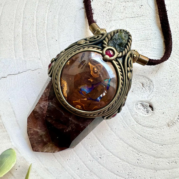One of a kind healing crystal wand featuring Super Seven Quartz and rare natural gemstones.
