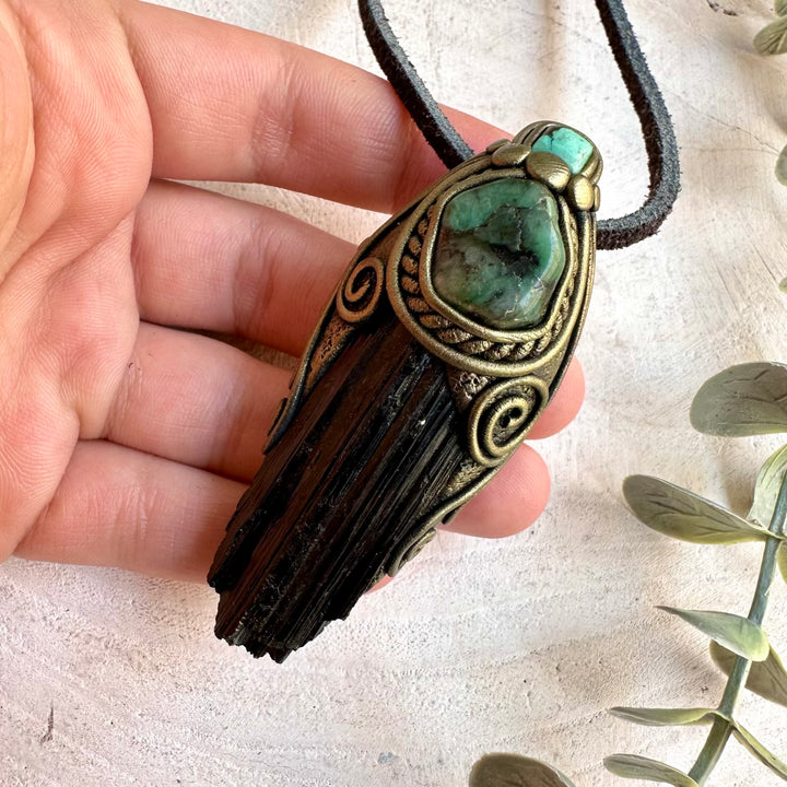 One of a kind gemstone pendant with Black Tourmaline, rich green Emerald and Tibetan Turquoise.