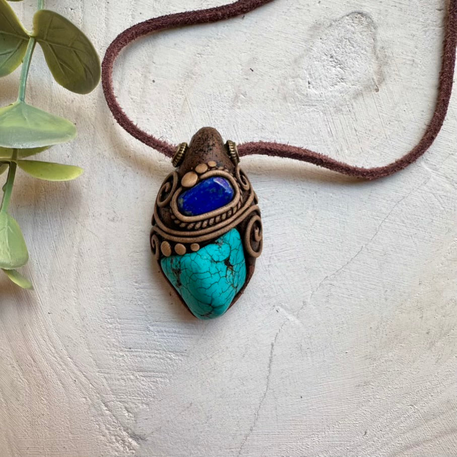 Handmade necklace featuring turquoise and lapis lazuli stones