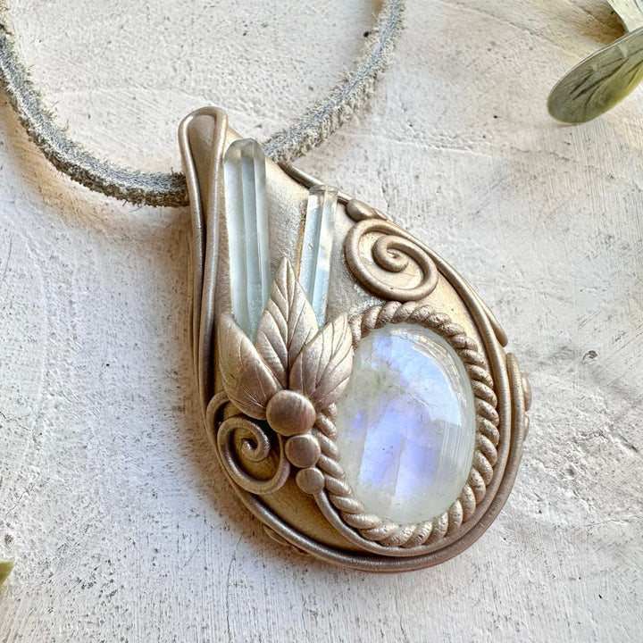 handmade spiritual gemstone pendant with aquamarine and moonstone