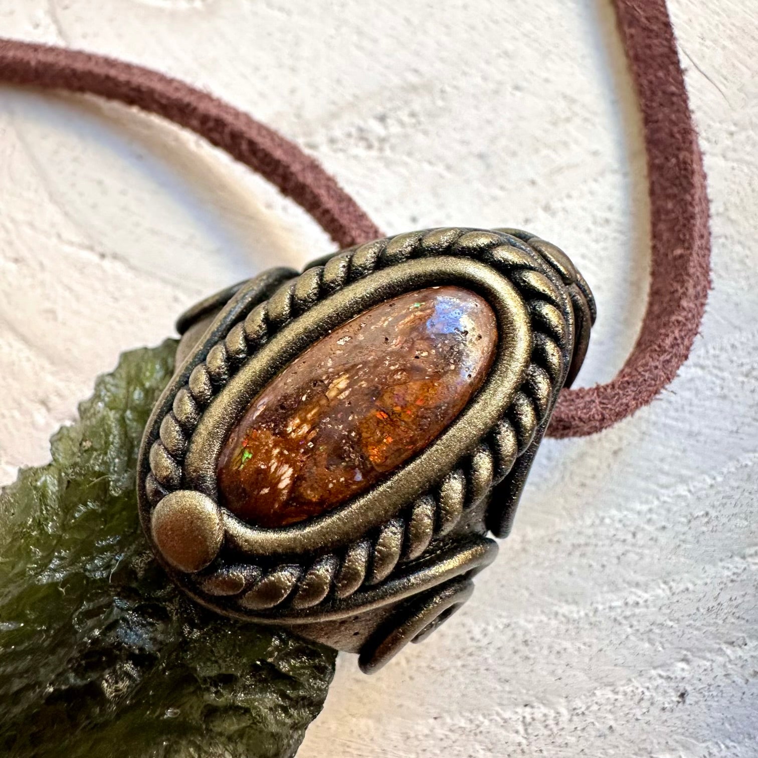 Handmade spiritual energy necklace featuring ethically sourced raw green Moldavite crystal and Australian Boulder Opal fire flash pendant.