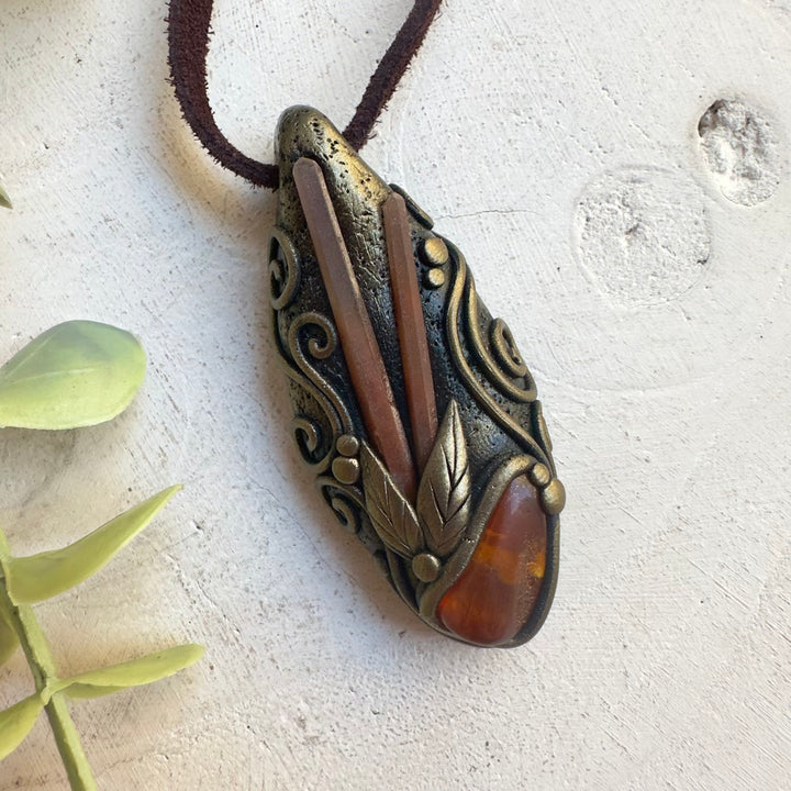 One of a kind gemstone necklace with Baltic Amber centerpiece