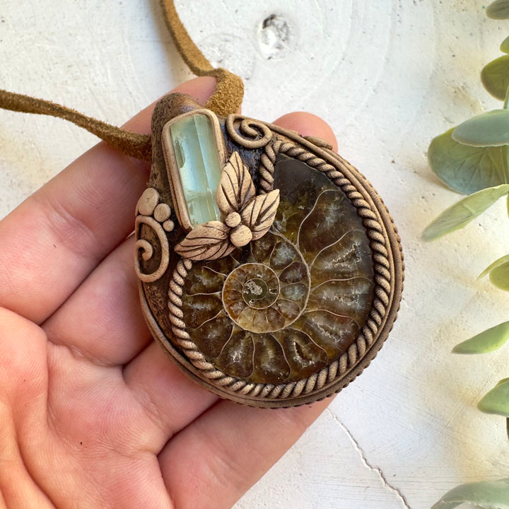 Aquamarine crystal necklace with ancient ammonite fossil