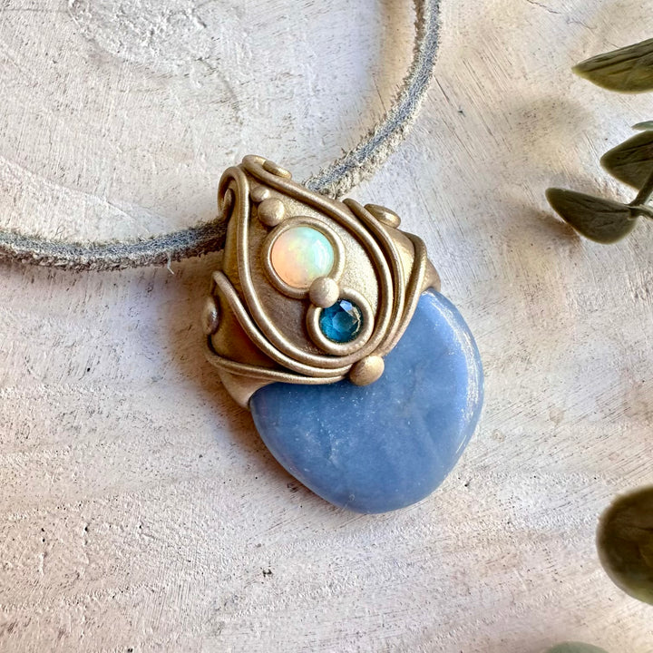 Handmade Angelite pendant necklace associated with peaceful energy, intuition and spiritual connection, accented with Ethiopian Opal and London Blue Topaz.
