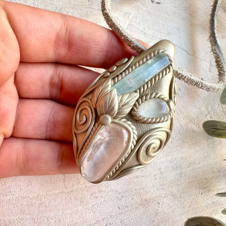 Unique gemstone jewelry featuring pale blue Aquamarine with sparkling Clear Topaz accents.