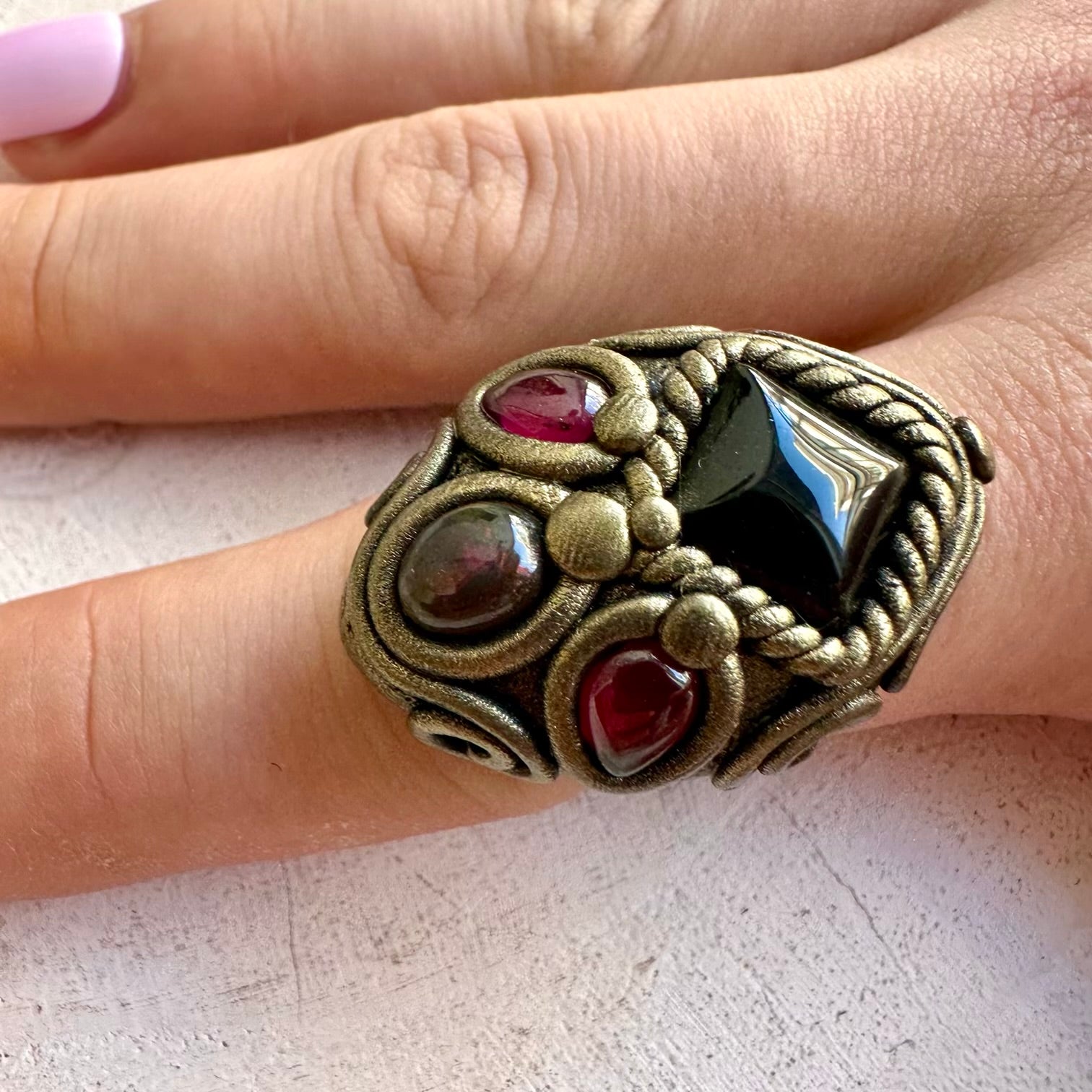 One of a kind gemstone ring with Black Onyx, iridescent Black Ethiopian Opal and deep red Rhodolite Garnet.