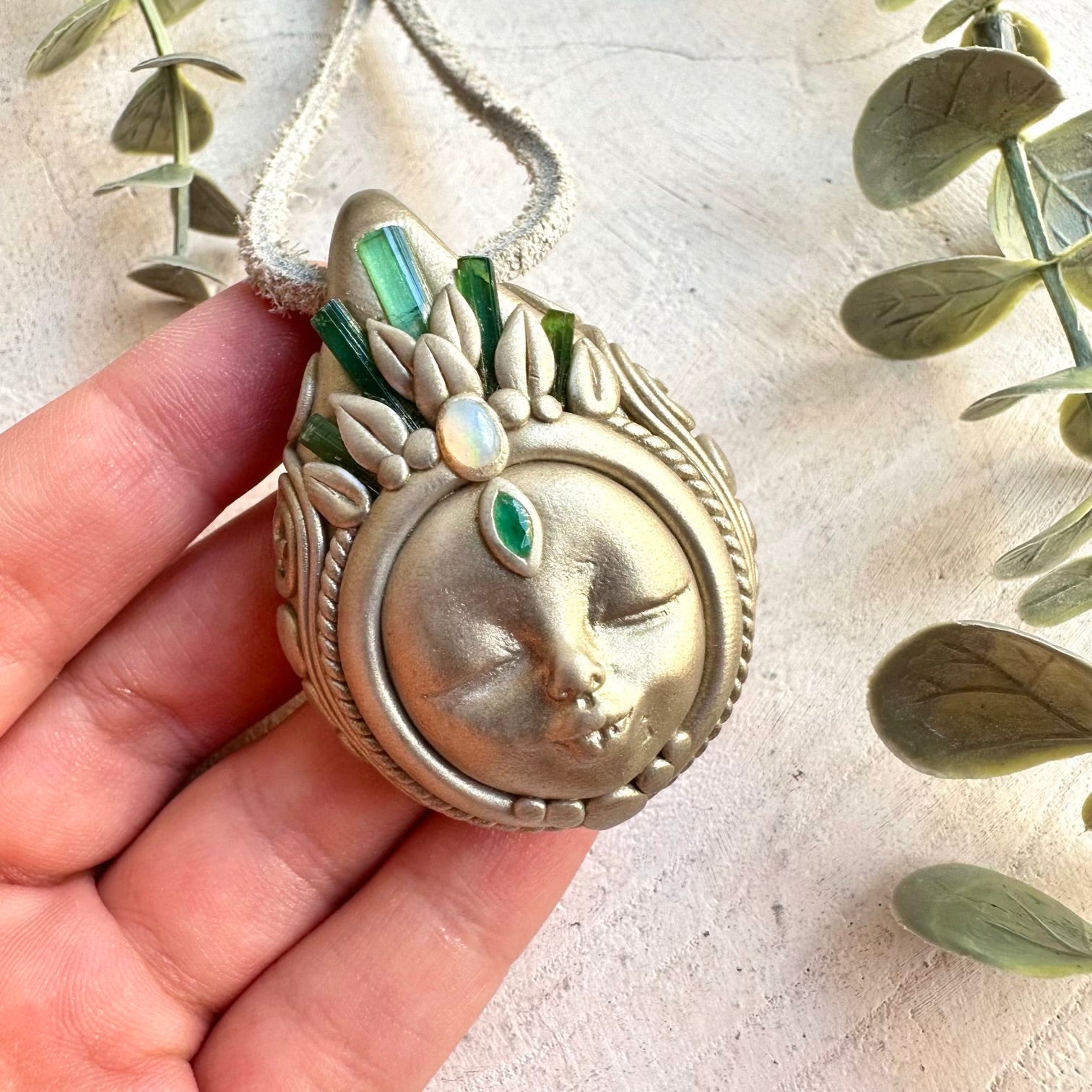 One of a kind crystal Goddess pendant with Green Tourmaline, shimmering Ethiopian Opal and natural Emerald.