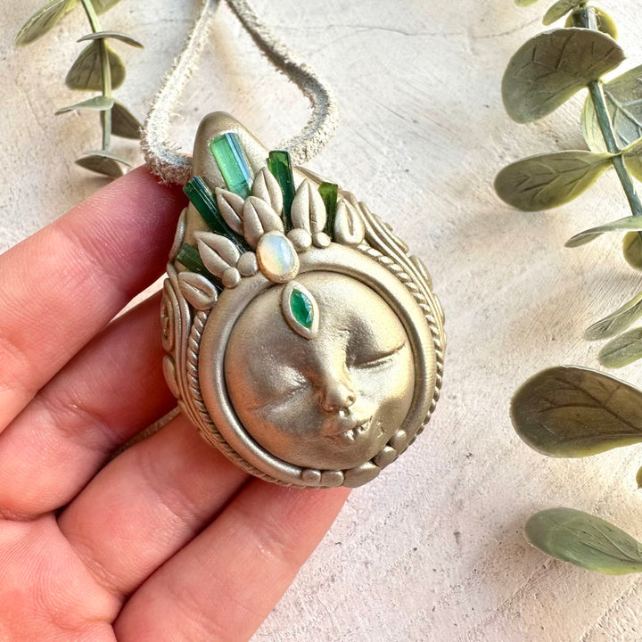 One of a kind crystal Goddess pendant with Green Tourmaline, shimmering Ethiopian Opal and natural Emerald.
