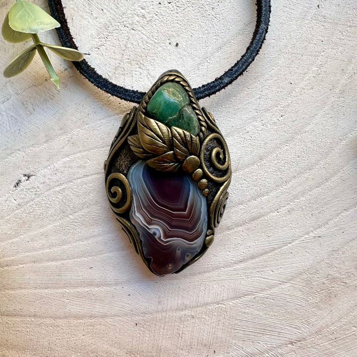 Botswana agate paired with emerald in a necklace