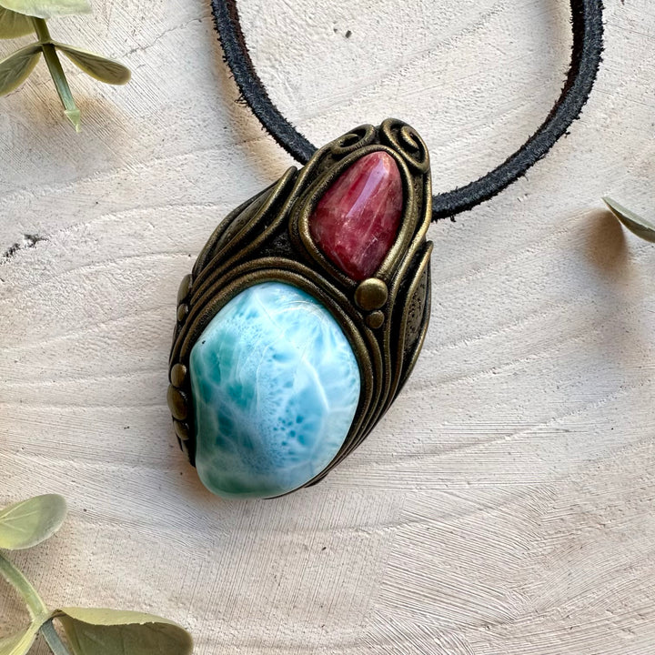 Larimar paired with gemmy rhodonite in a necklace
