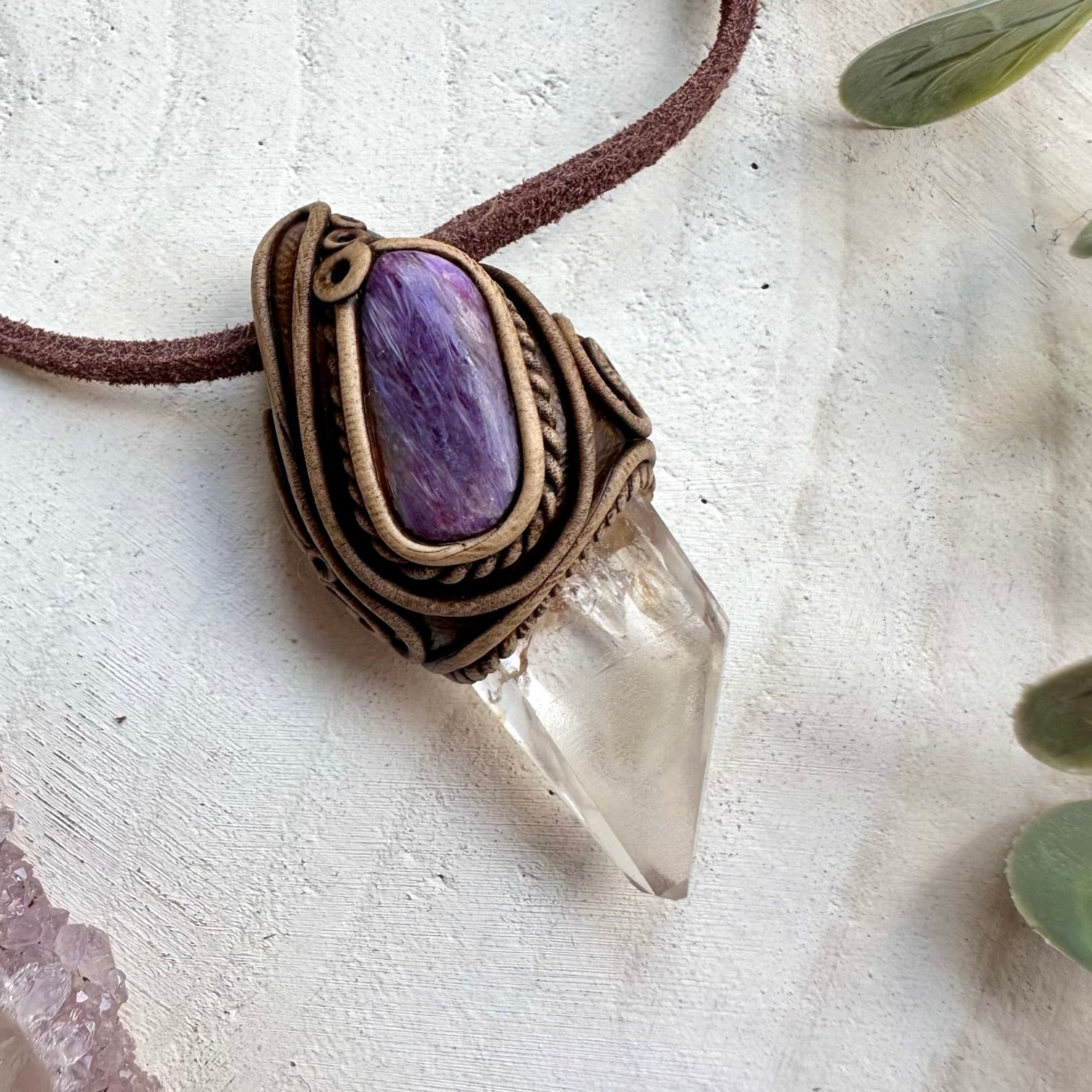 Lemurian quartz paired with charoite in a necklace