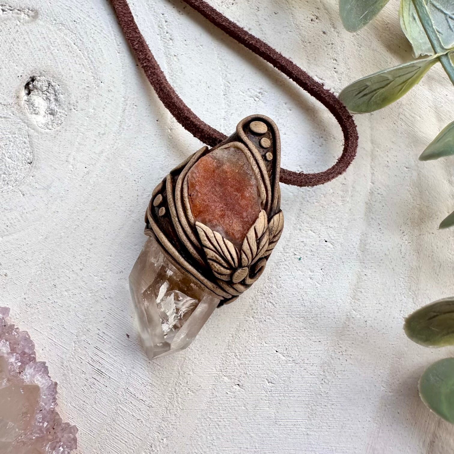 Healing crystal pendant with quartz and sunstone
