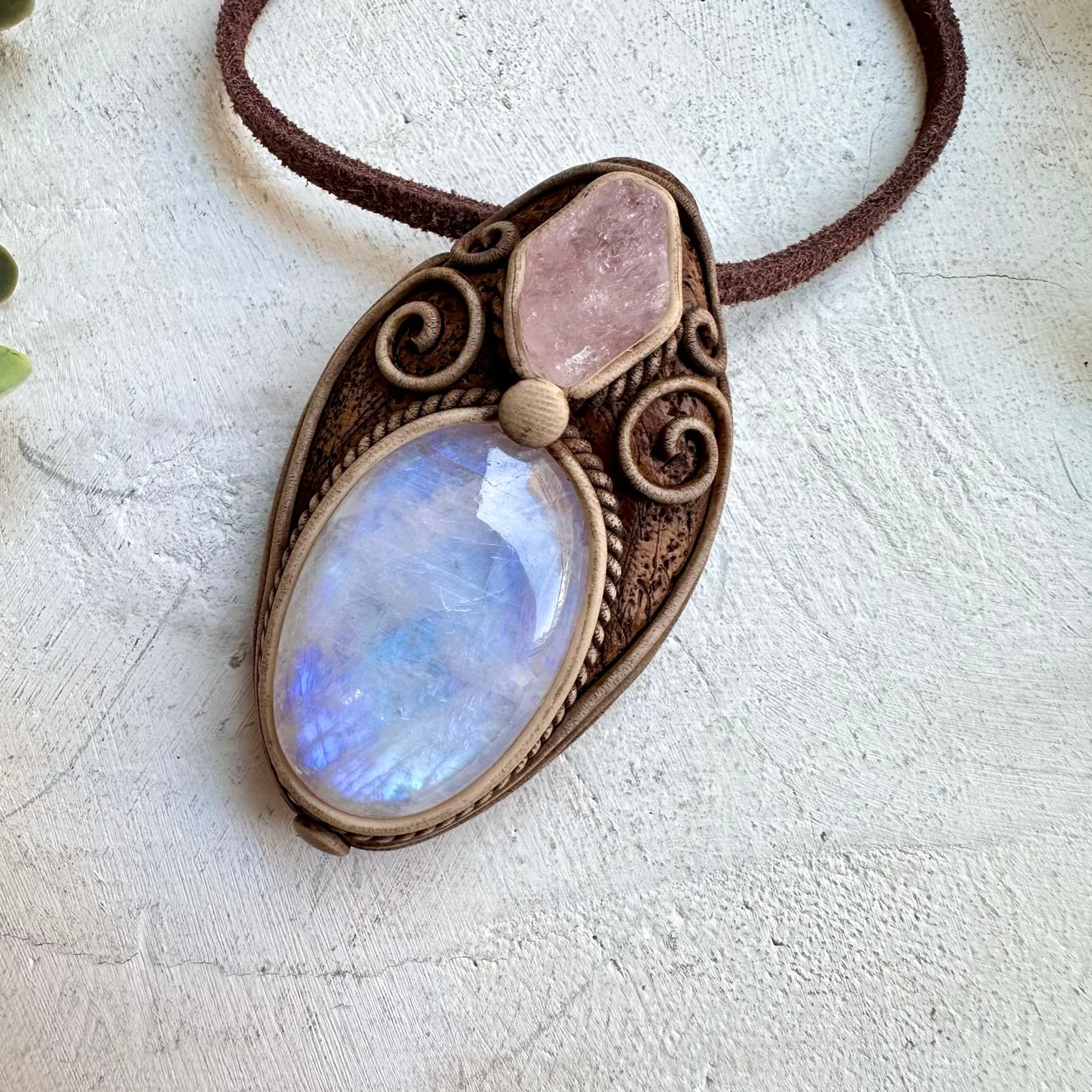 Rainbow moonstone paired with morganite in a necklace