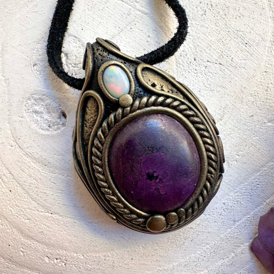 Handmade spiritual crystal jewelry talisman necklace with ethically sourced Purpurite and luminous Australian Opal pendant.