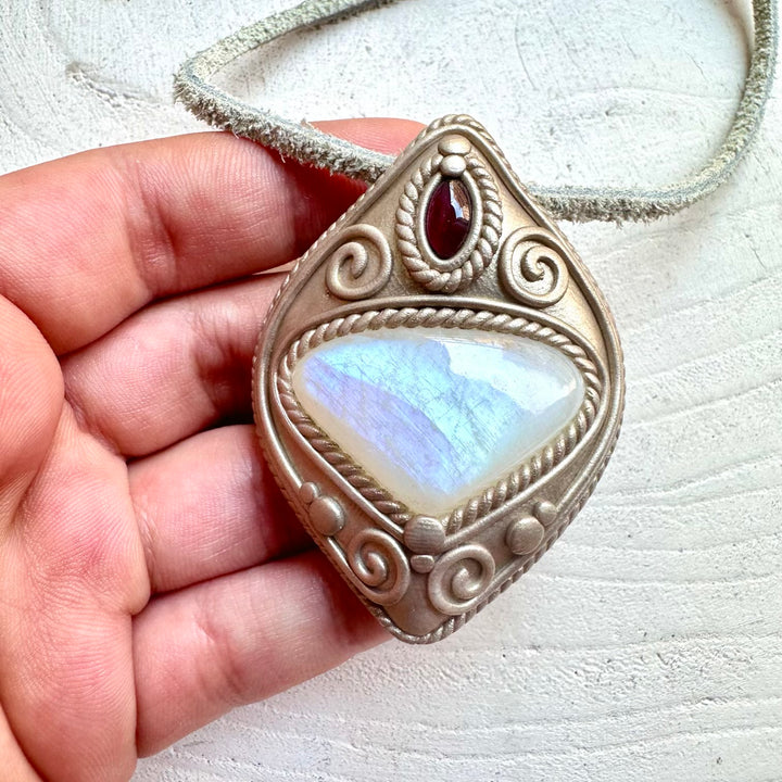 Metaphysical crystal jewelry necklace with rainbow moonstone and rhodolite garnet