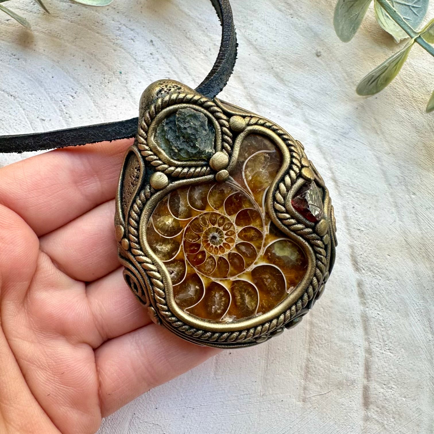 Moldavite ammonite and garnet healing crystal necklace