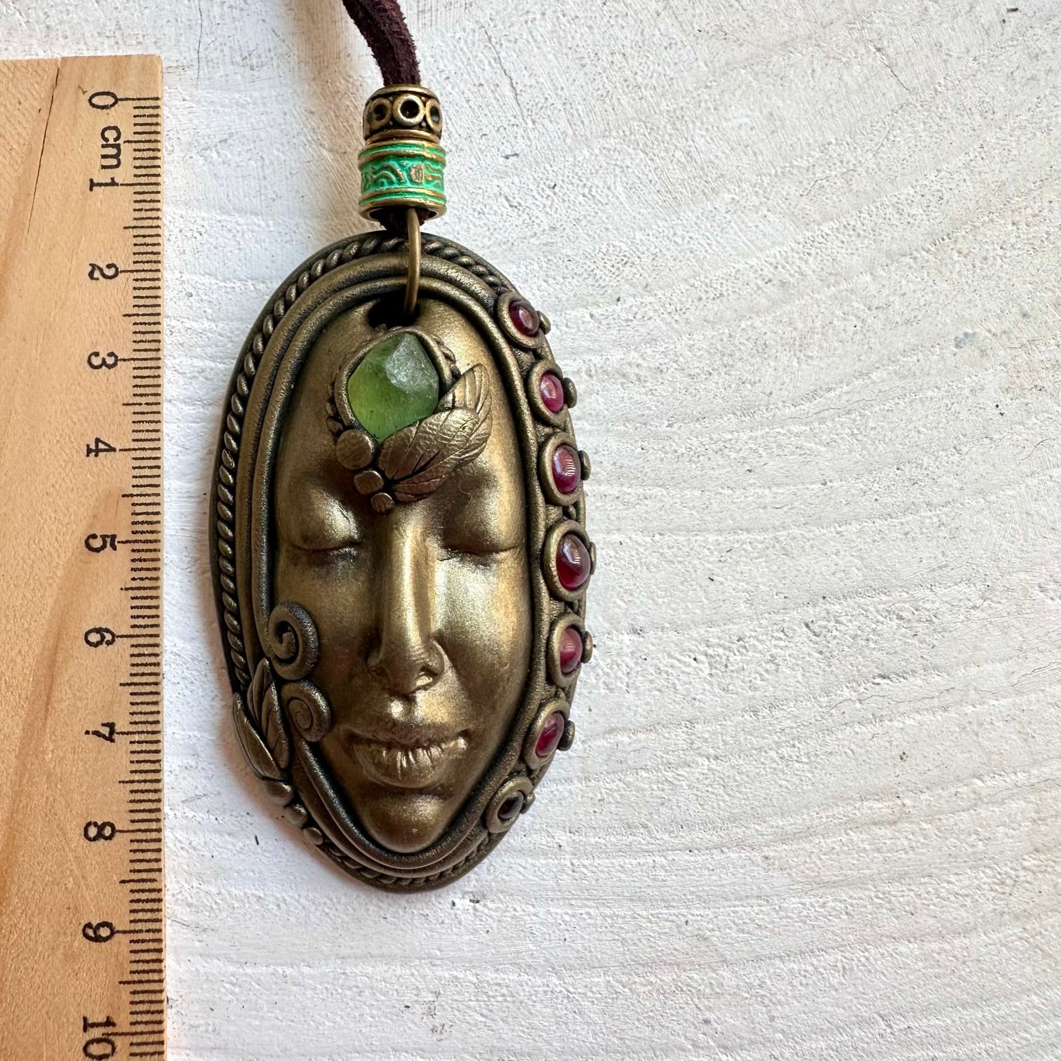 Handmade Goddess necklace featuring natural Peridot and Rhodolite Garnet gemstones.