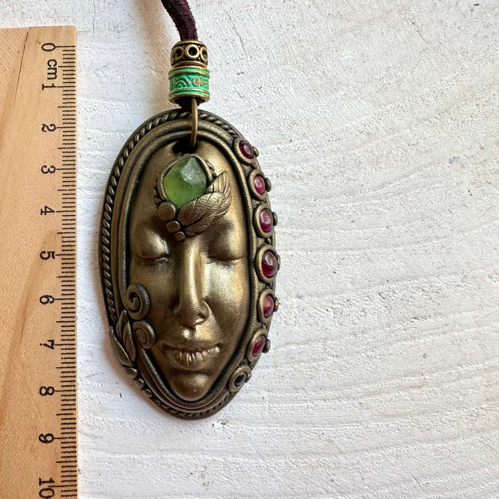 Handmade Goddess necklace featuring natural Peridot and Rhodolite Garnet gemstones.