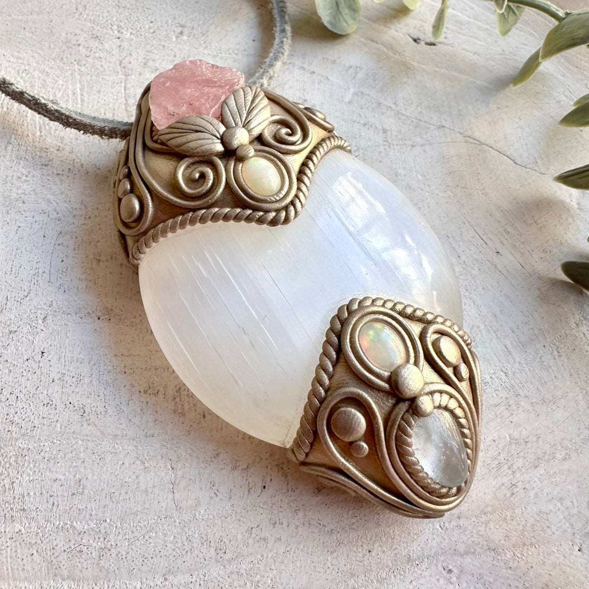 Artisan crystal talisman showcasing Selenite with soft pink Morganite, Clear Topaz and Ethiopian Opal.