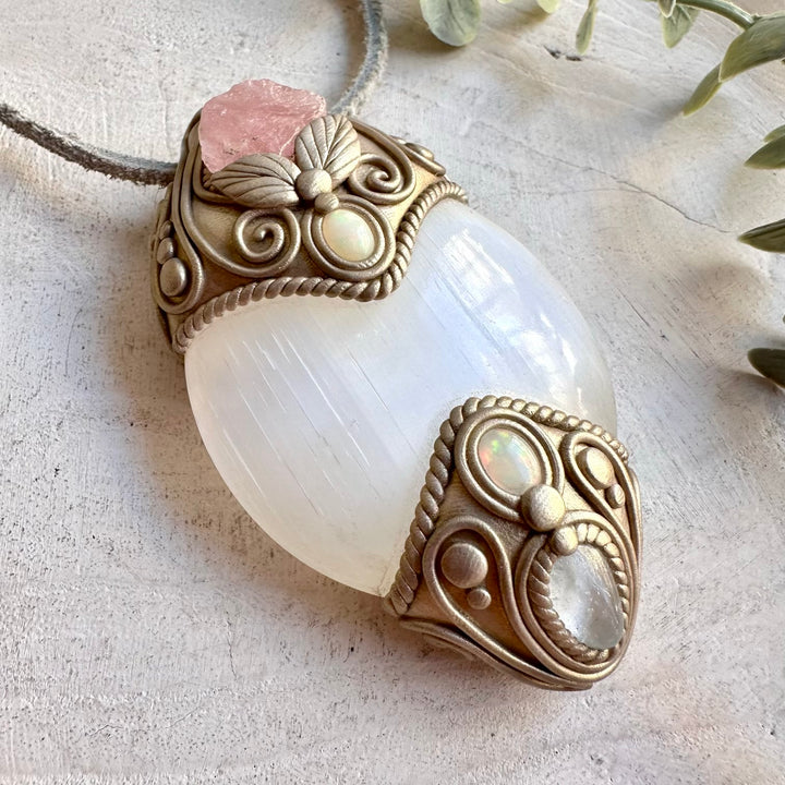 Artisan crystal talisman showcasing Selenite with soft pink Morganite, Clear Topaz and Ethiopian Opal.