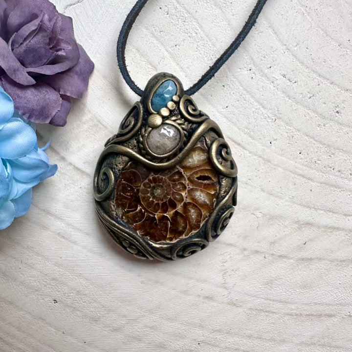 piritual Ammonite fossil with Aquamarine and Morganite pendant necklace for meditation, manifestation, and festival style.