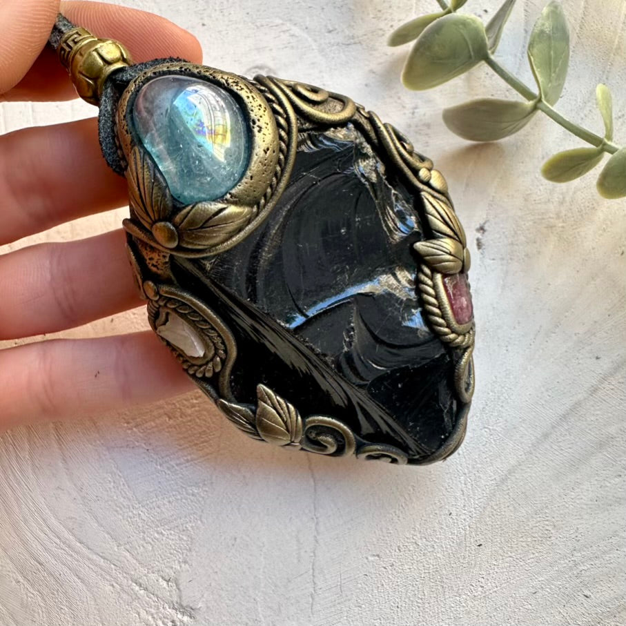 Handmade sacred healing crystal talisman for energy work and protection