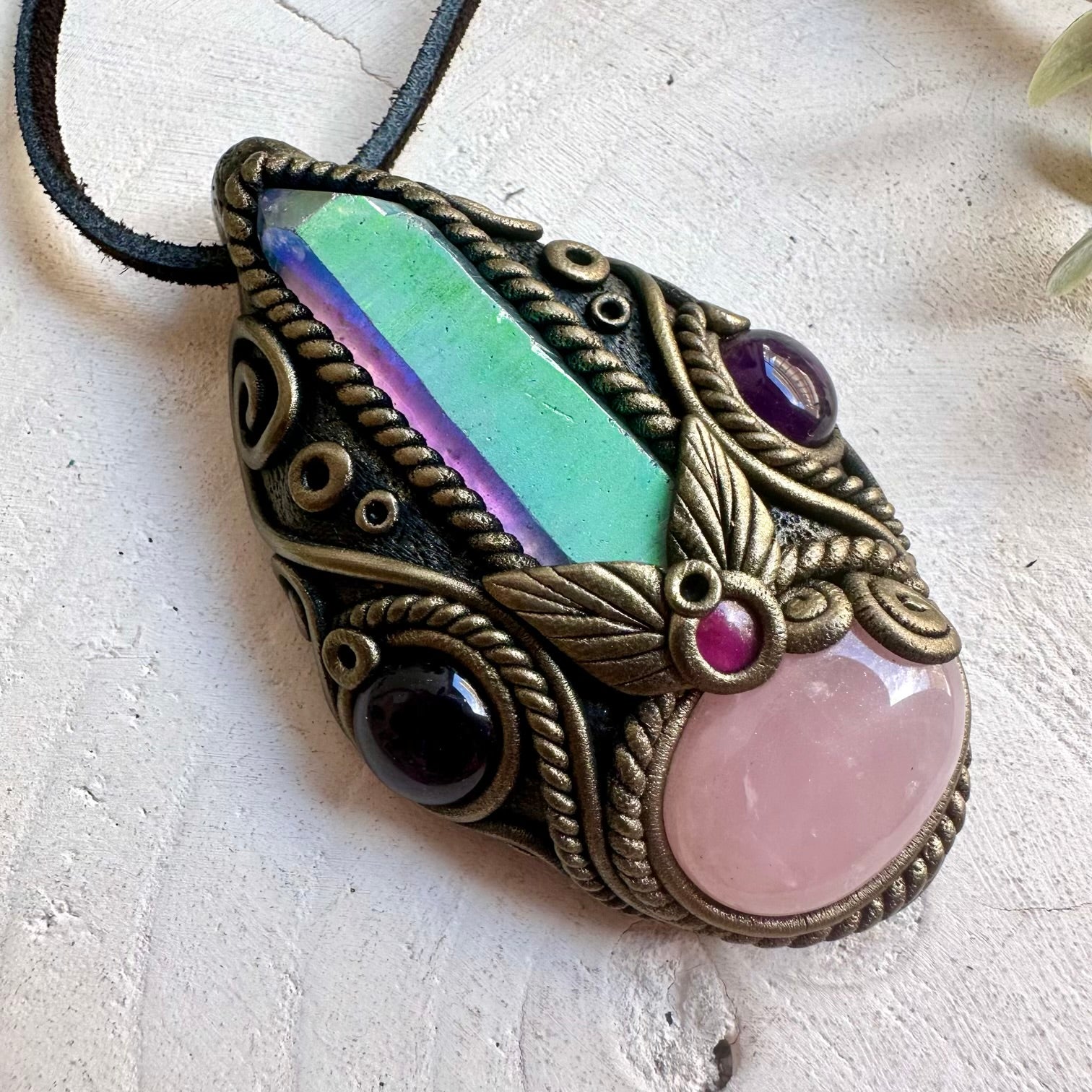 Unique artisan necklace combining Rose Quartz, Amethyst and Rhodolite Garnet natural crystals.