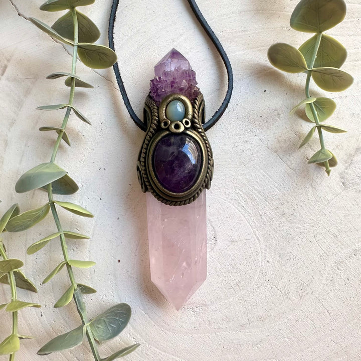 Unique handmade crystal wand featuring Rose Quartz with Deep Purple Spirit Quartz and Chalcedony.