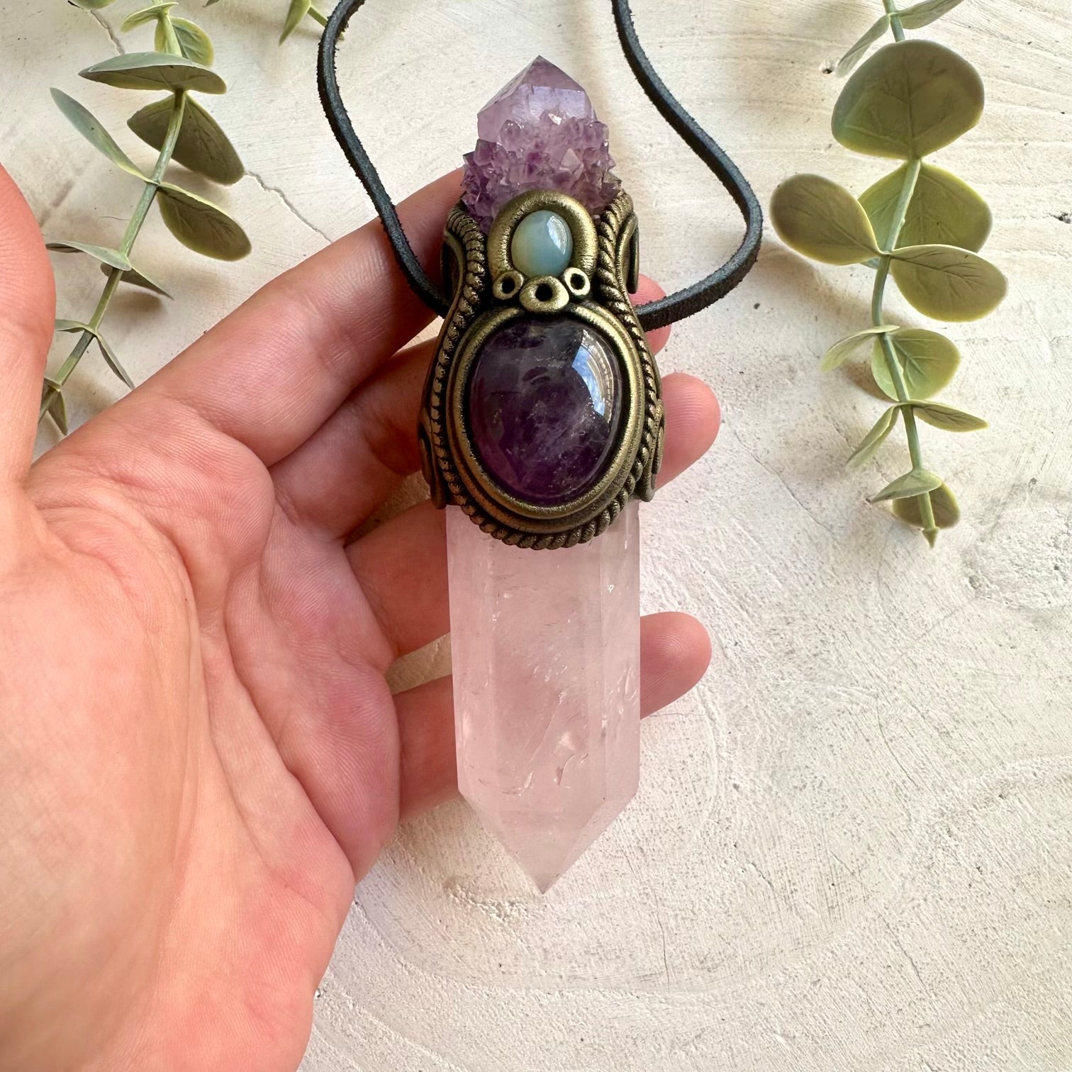 Handmade ritual tool crafted with premium natural crystals for spiritual practice and energy work.