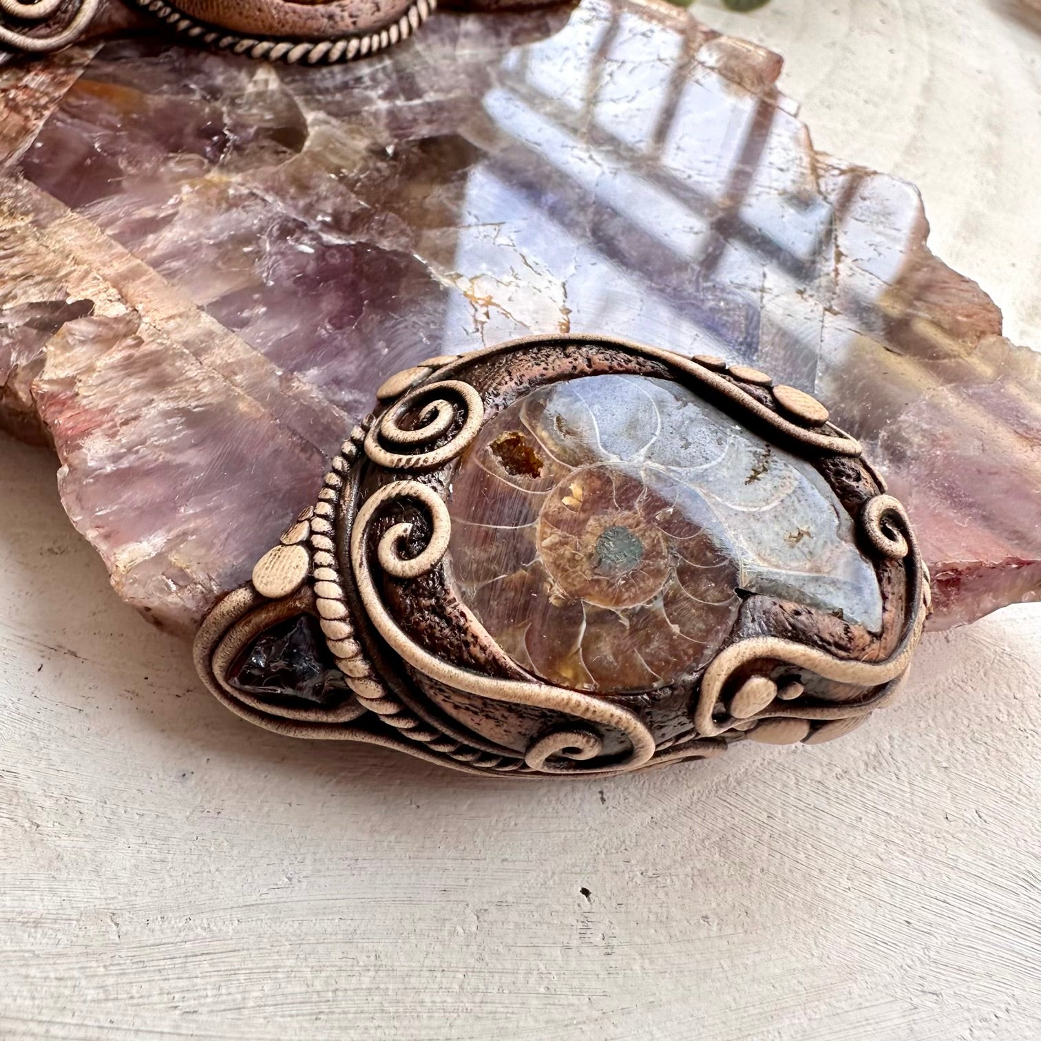 Close up of handmade crystal wall hanging with rare minerals