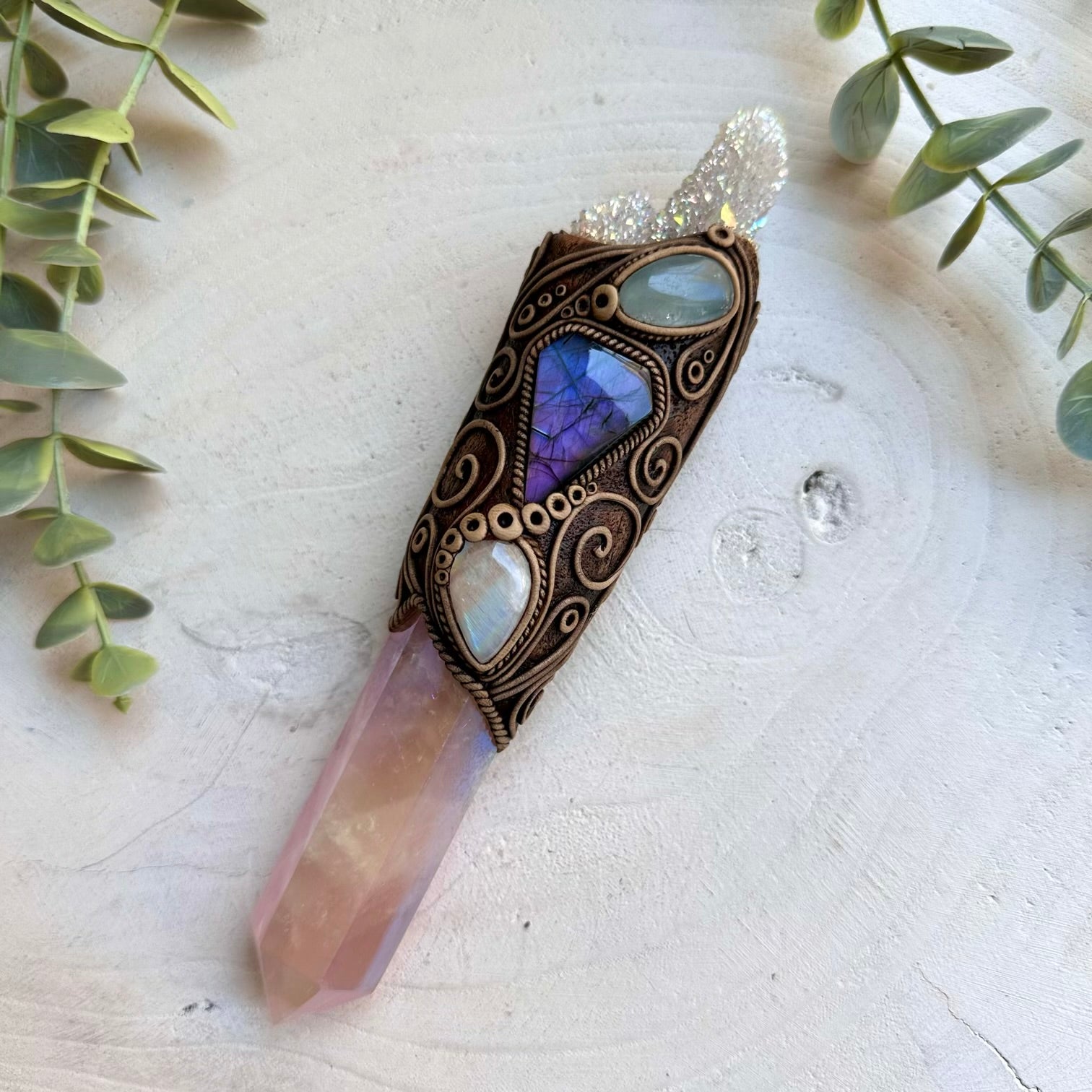 Angel aura quartz paired with moonstone and labradorite in a wand pendant