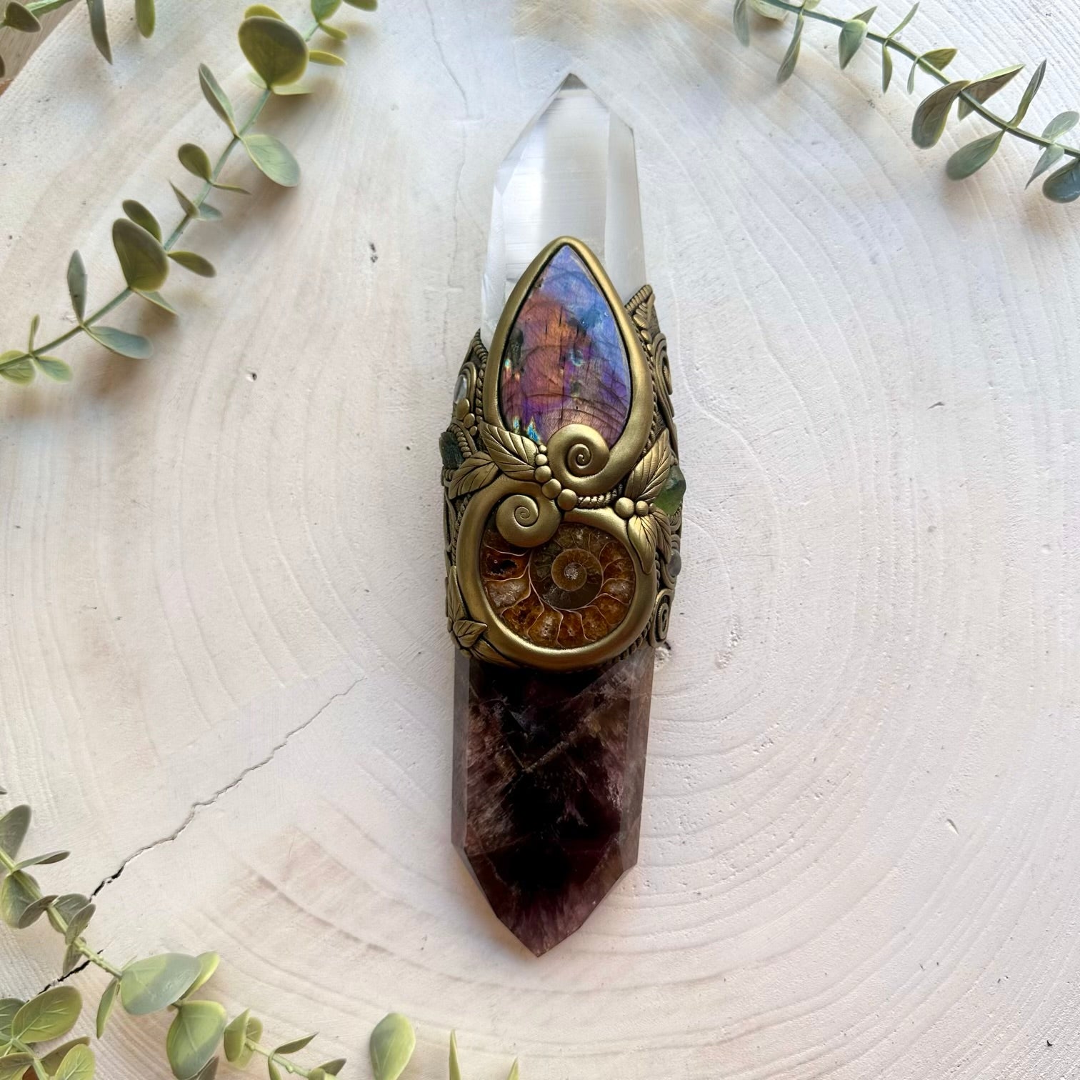 Ritual energy wand combining Super Seven Quartz, Labradorite, Ammonite and Peridot.