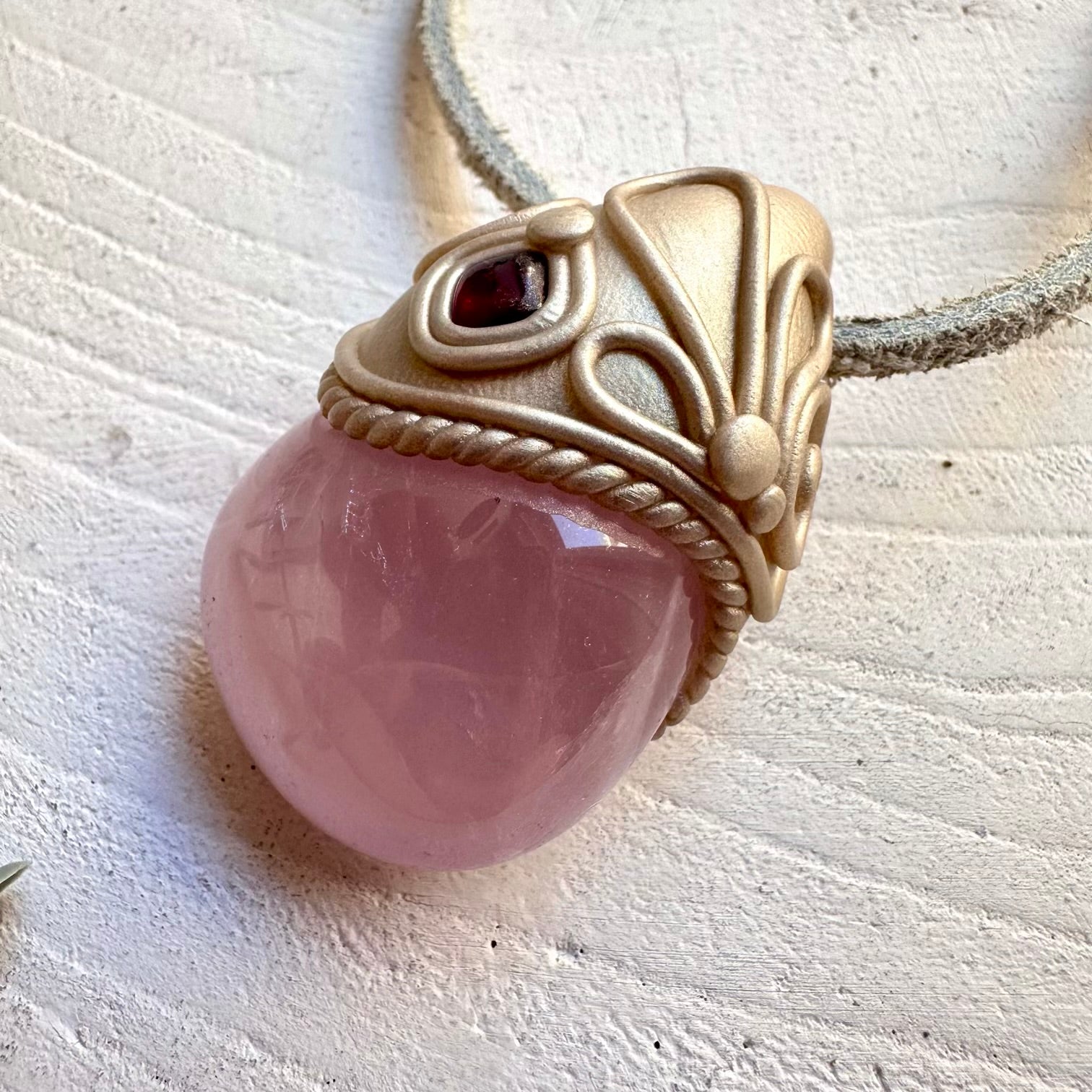 Metaphysical crystal jewelry handmade with clay rose quartz and garnet
