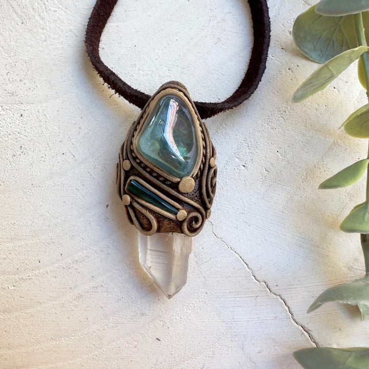 Unisex crystal jewelry featuring Lemurian Seed Quartz and Blue Tourmaline