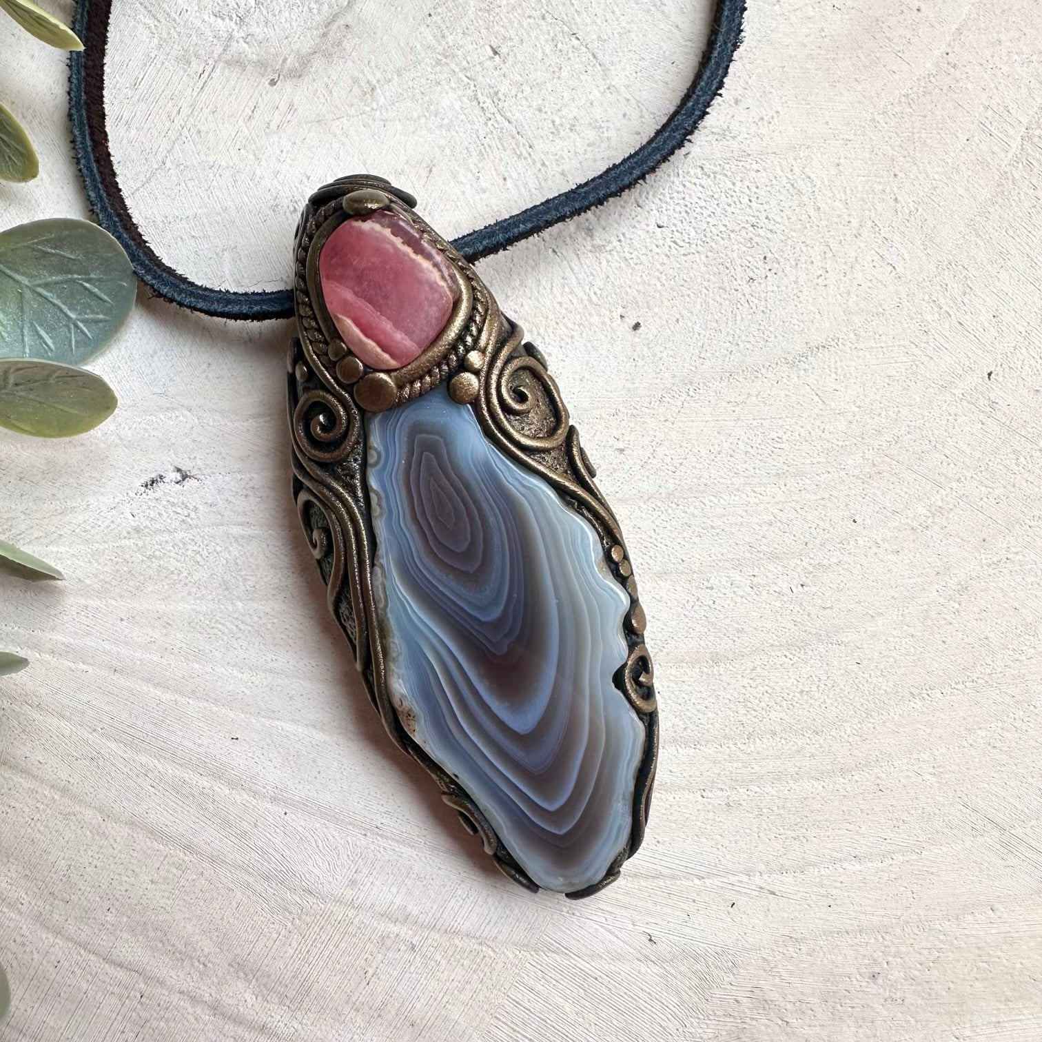 Healing stone necklace made with Botswana agate and rhodochrosite crystals for calming energy