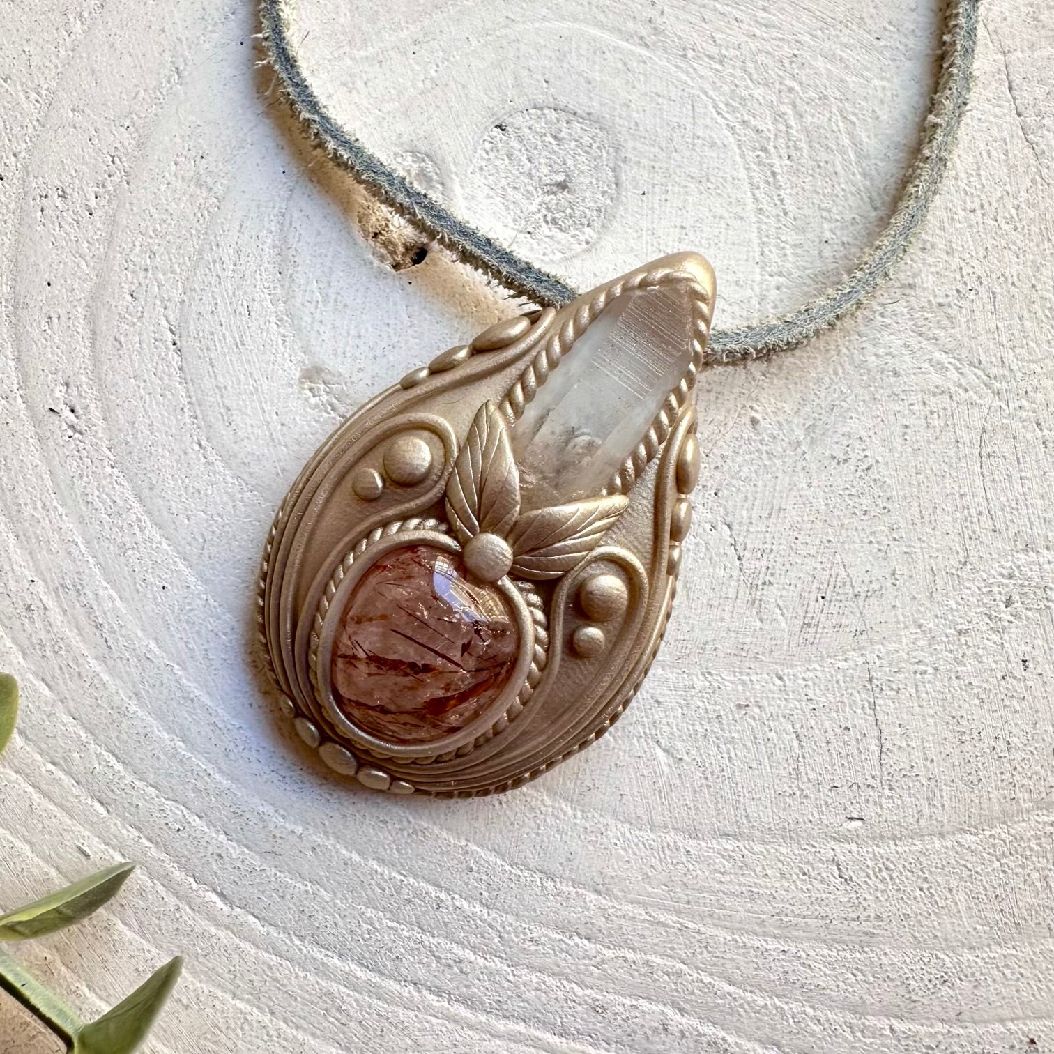 Metaphysical jewelry Lemurian Seed Quartz and Hematite Quartz pendant necklace