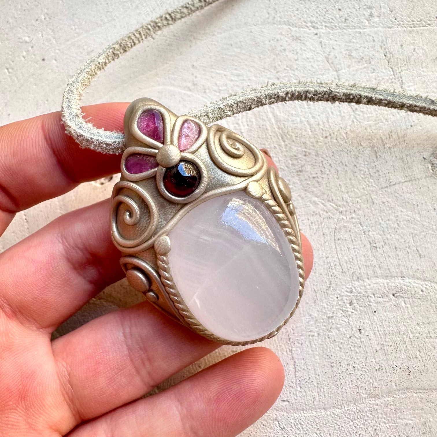Protection amulet crystal necklace with mango calcite and pink tourmaline gemstones