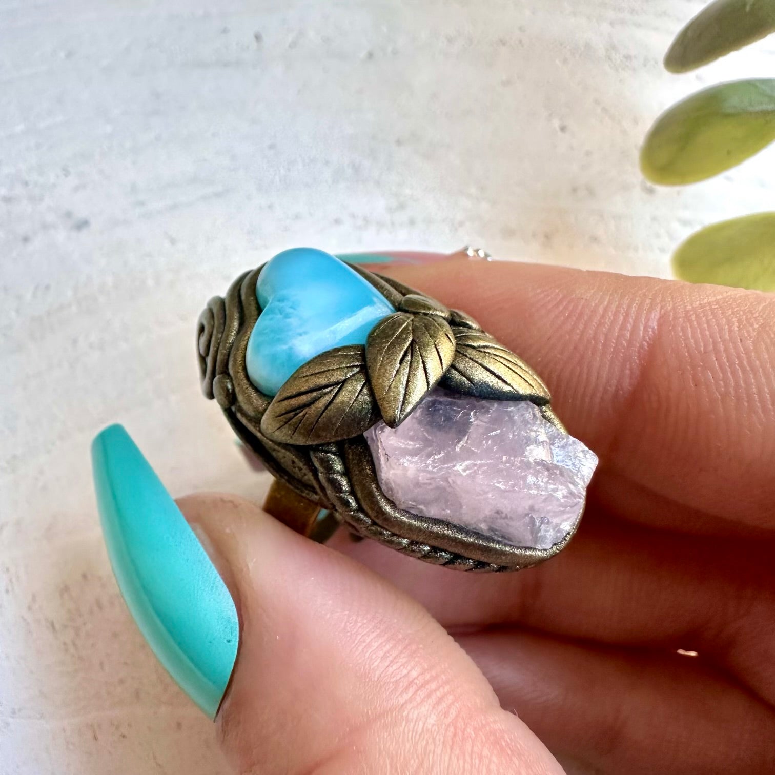 Artisan gemstone ring with larimar heart crystal