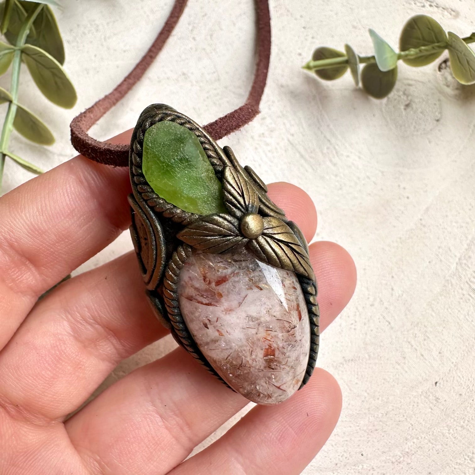Handmade Hematite Quartz and Peridot healing crystal necklace with spiritual gemstone pendant for grounding and positivity.