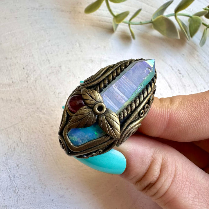 Close up of angel aura quartz and Ethiopian opal ring