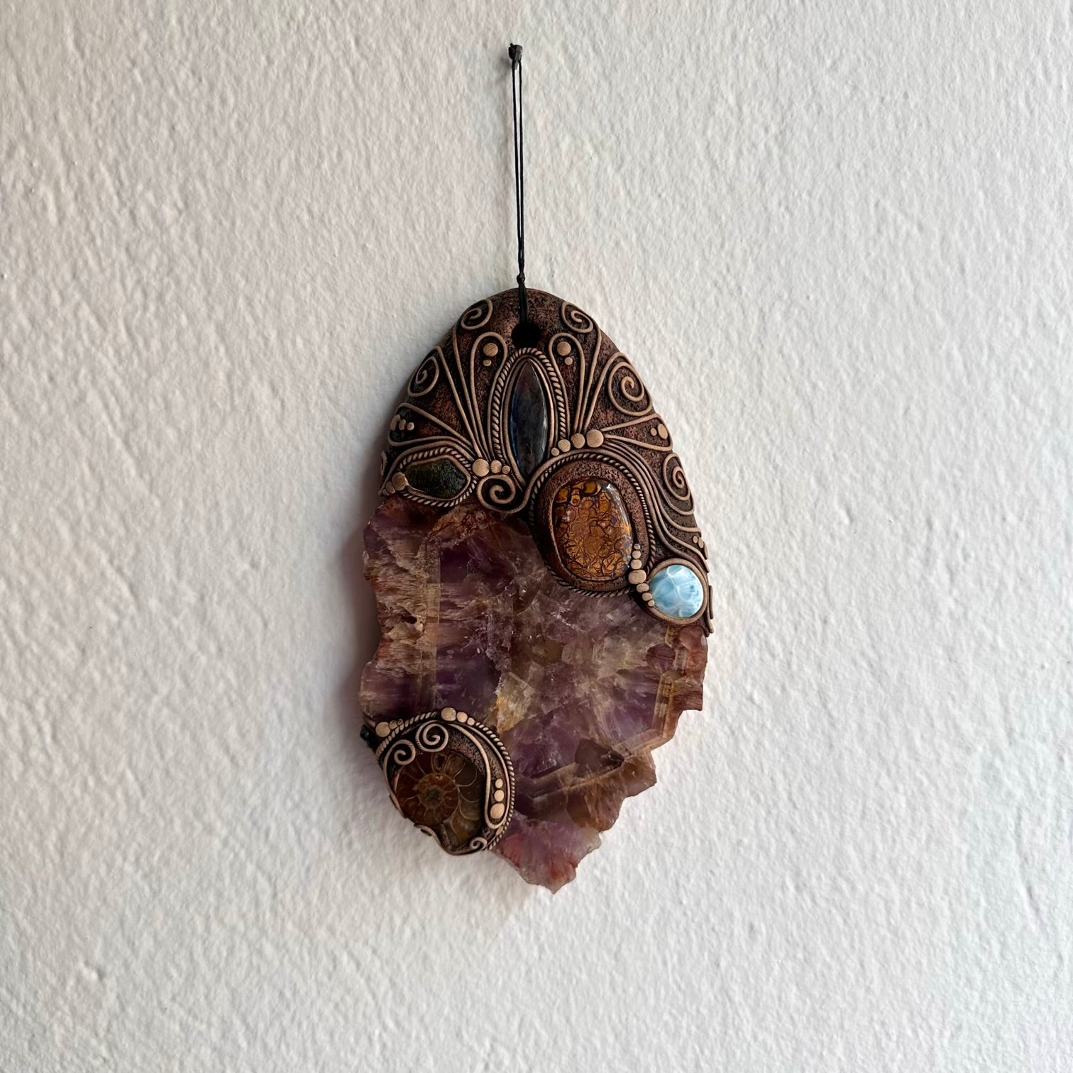 Unique spiritual wall art with larimar labradorite and red garnet crystals