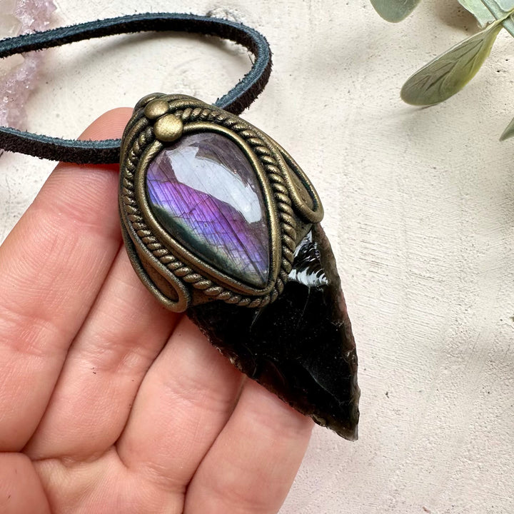 Handmade talisman necklace with obsidian arrowhead and labradorite