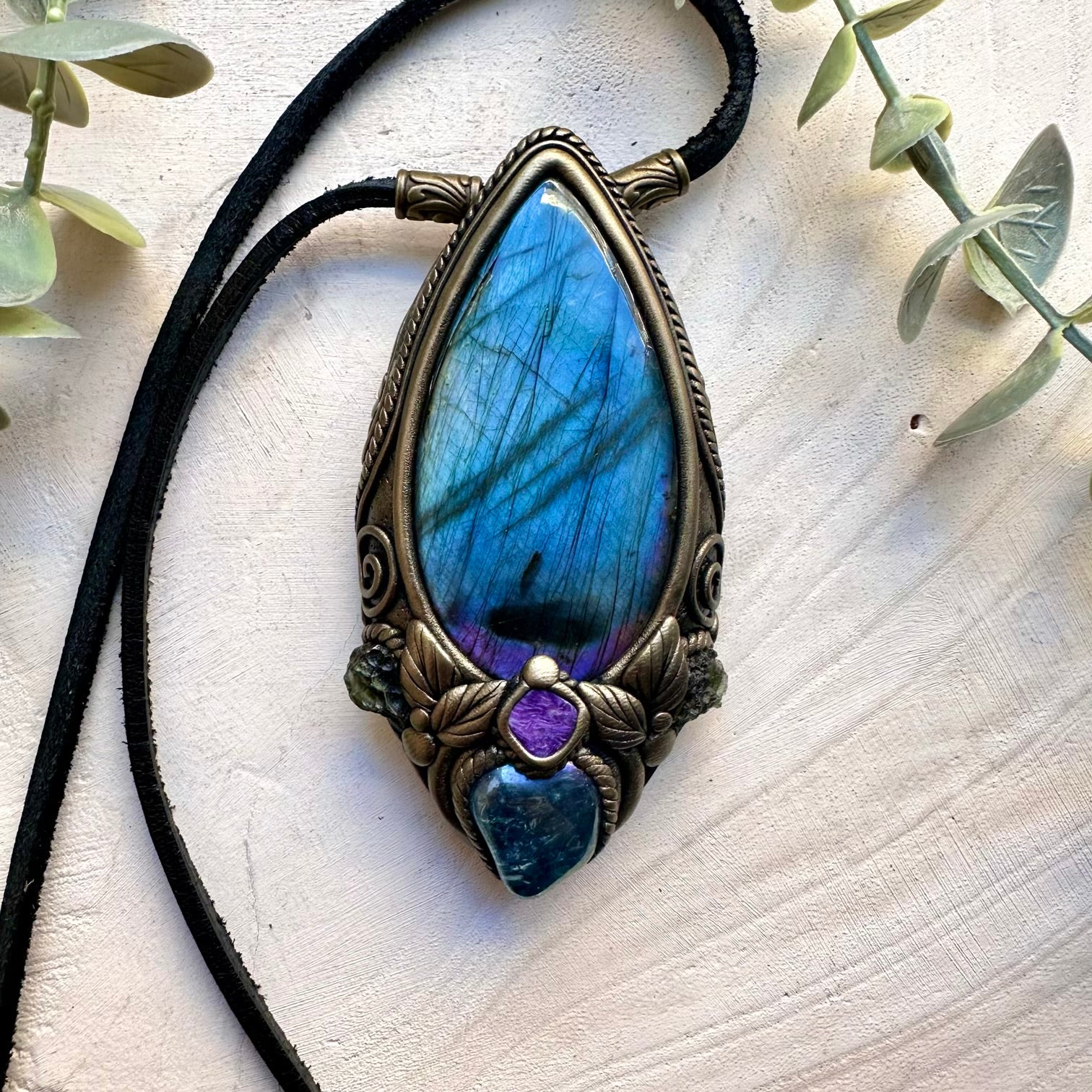Handmade statement necklace featuring labradorite aqua aura quartz and moldavite